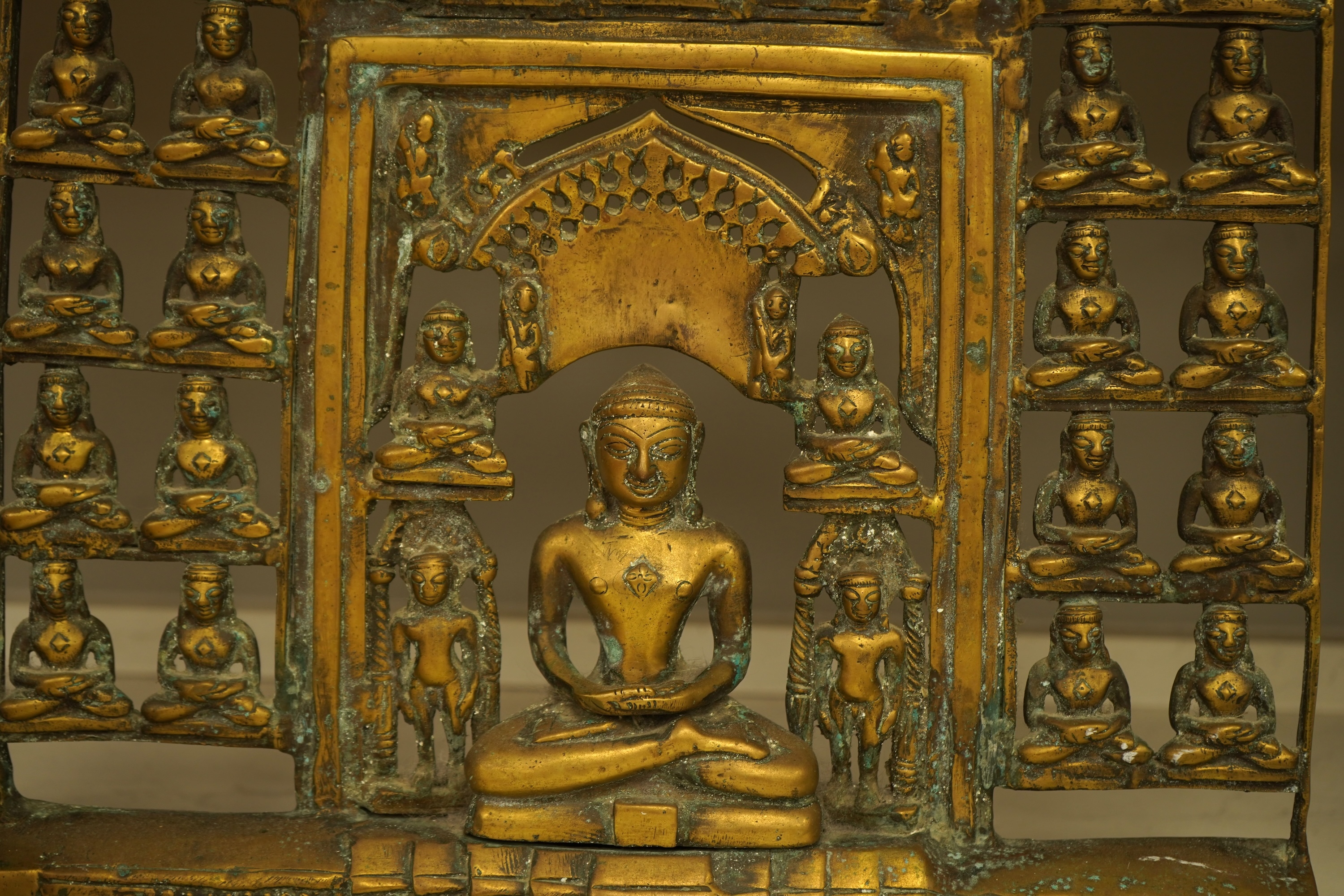 An Indian bronze temple panel with deities, 40cm high
